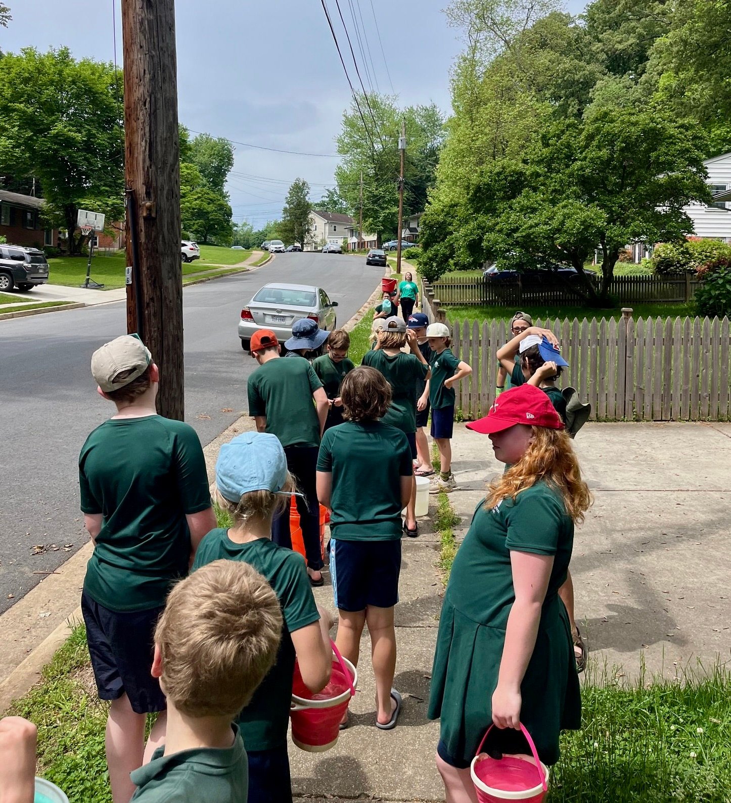 students walking through a neighborhood